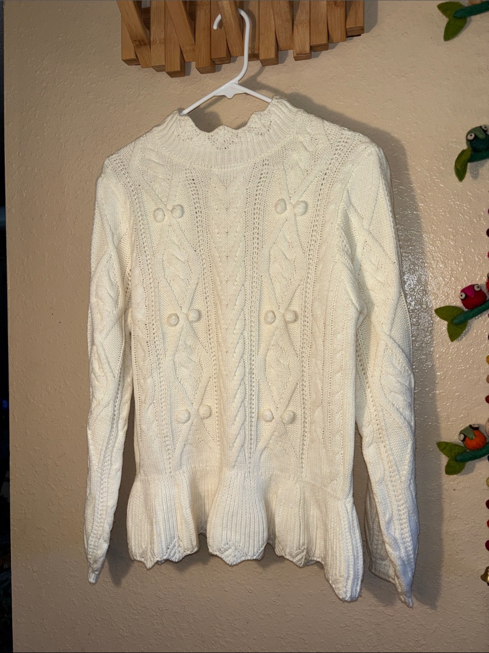 EUC Aaron &Amber Cable-Knit Pom-Pom Peplum Sweater. It features a cream